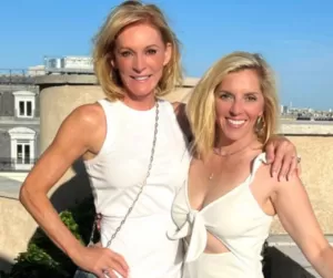 liz hilliard, 69, left, on a rooftop with her fiancée, lee kennelly, 44_courtesy of liz hilliard__png