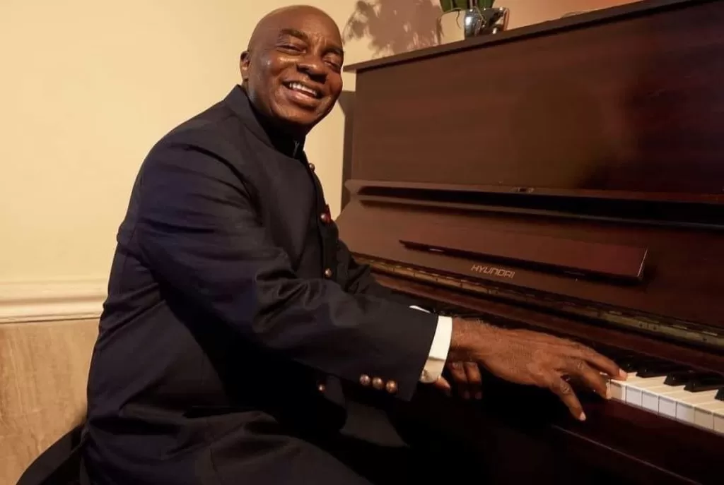 Photo of Bishop David Oyedepo seen playing piano in 2024